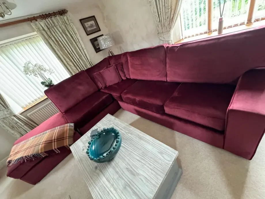 Luxury Velvet maroon double pull out spring sofa bed on legs.