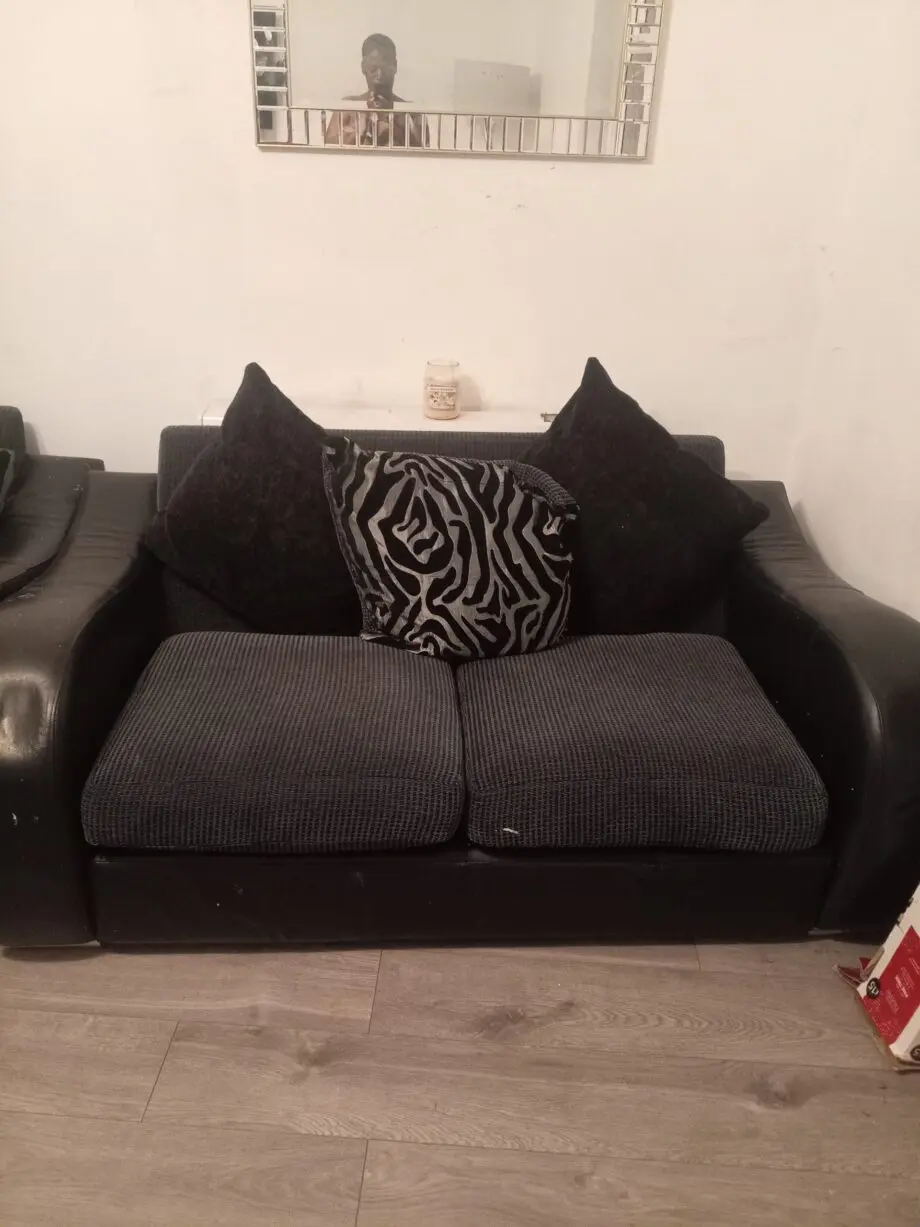 DFS Leather and fabric sofa black