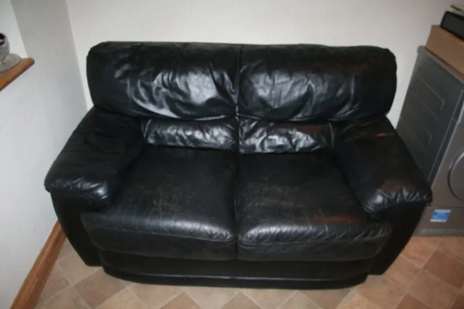 3and2 seater black hand made Italian leather sofas from Harvey's