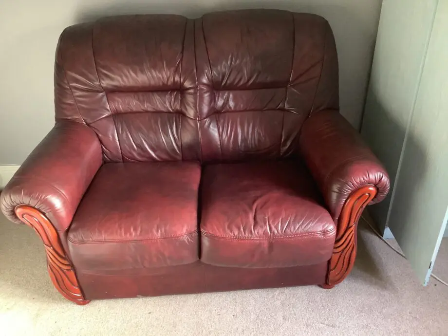 DFS two two seater,blood red leather sofas