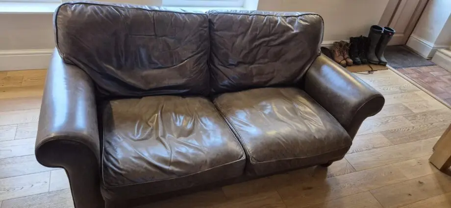 Laura Ashley brown leather sofa