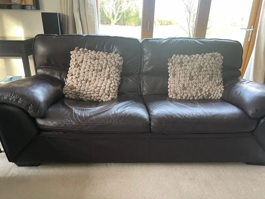 2 x three seater brown leather sofas