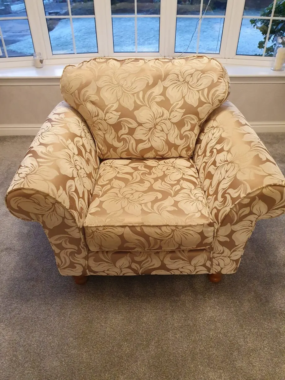 Gold and beige floral armchair