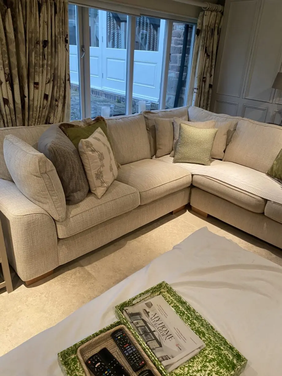 Large immaculate L shaped sofa