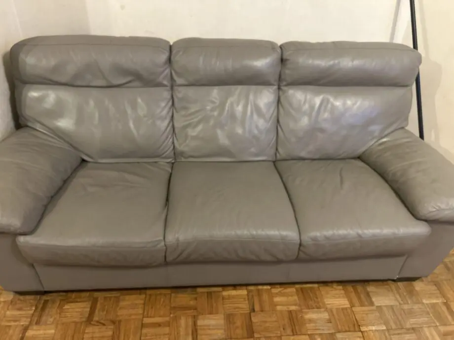 Grey leather 3 seater sofas x2