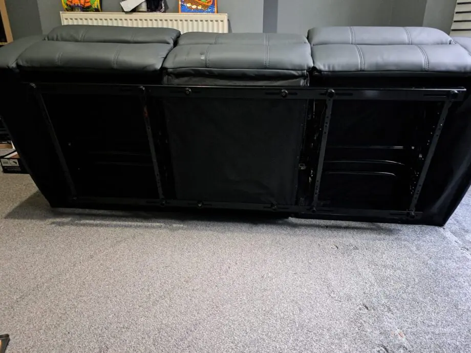 3 seater recliner sofa grey with two cup rest in the middle