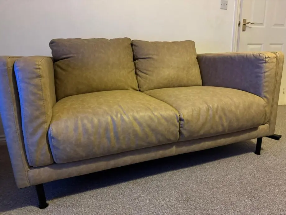 One coffee brown 3seater and one cream 2seater sofas