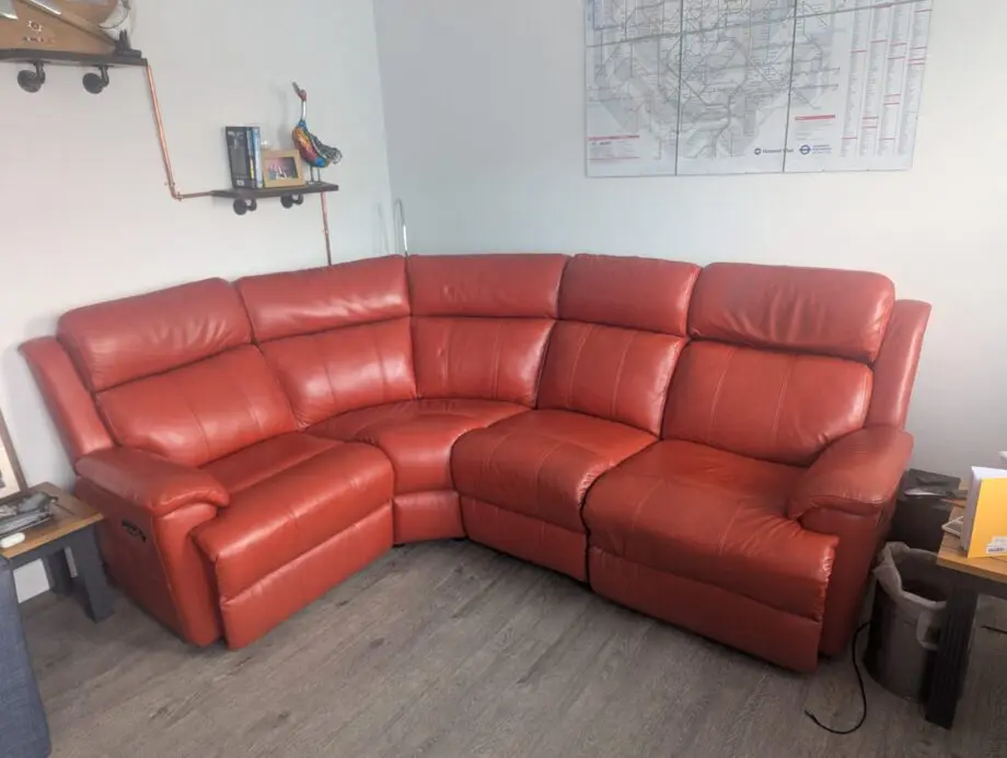 Red double reclining corner sofa