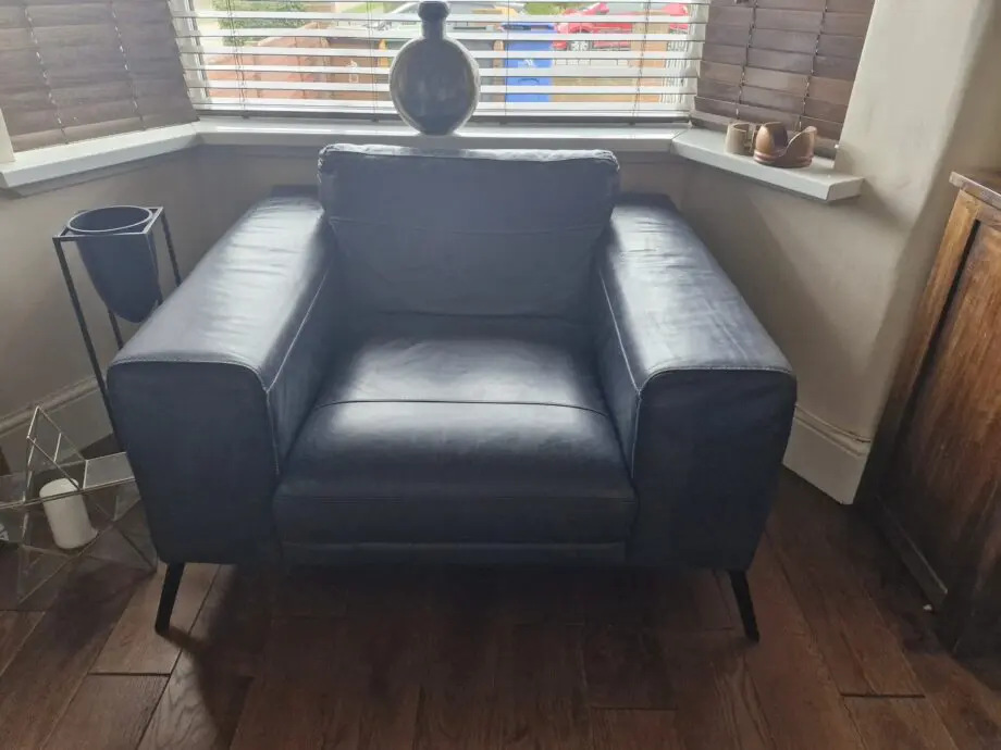DFS navy leather corner sofa and chair