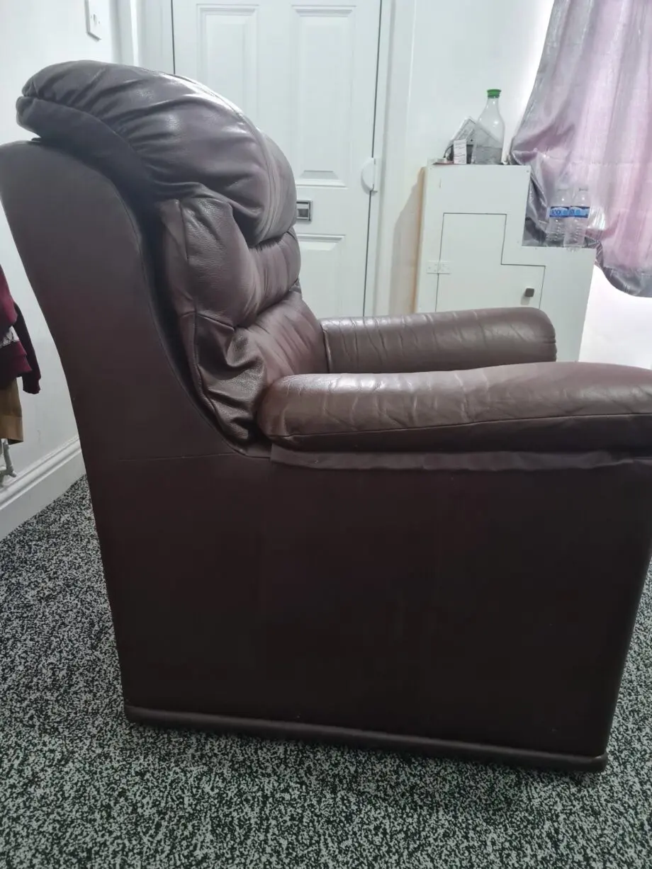 Brown leathet single seater sofa