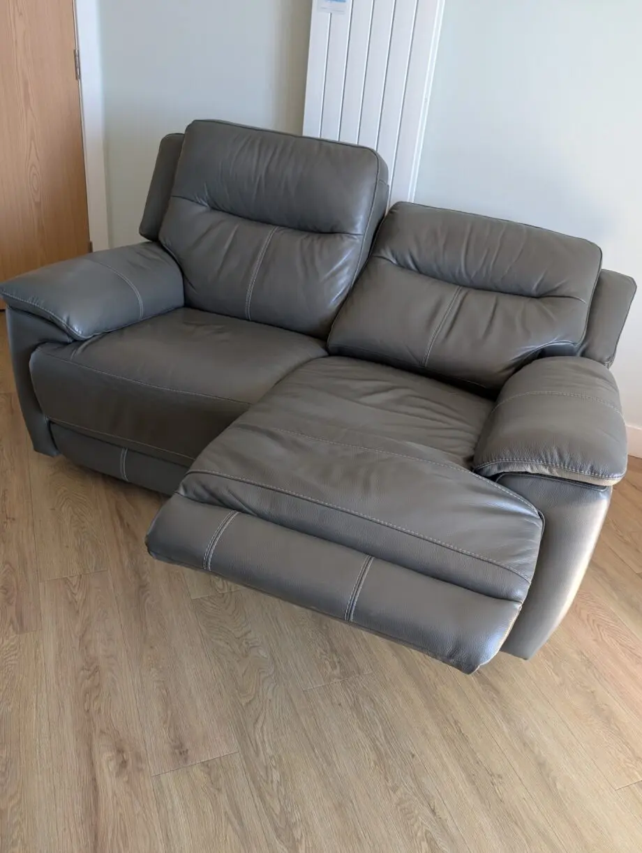 DFS Gray leather 2 seater electric recliner sofa
