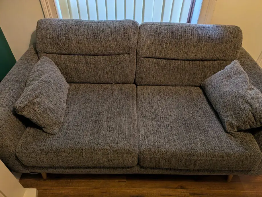 Grey fabric sofa in good condition