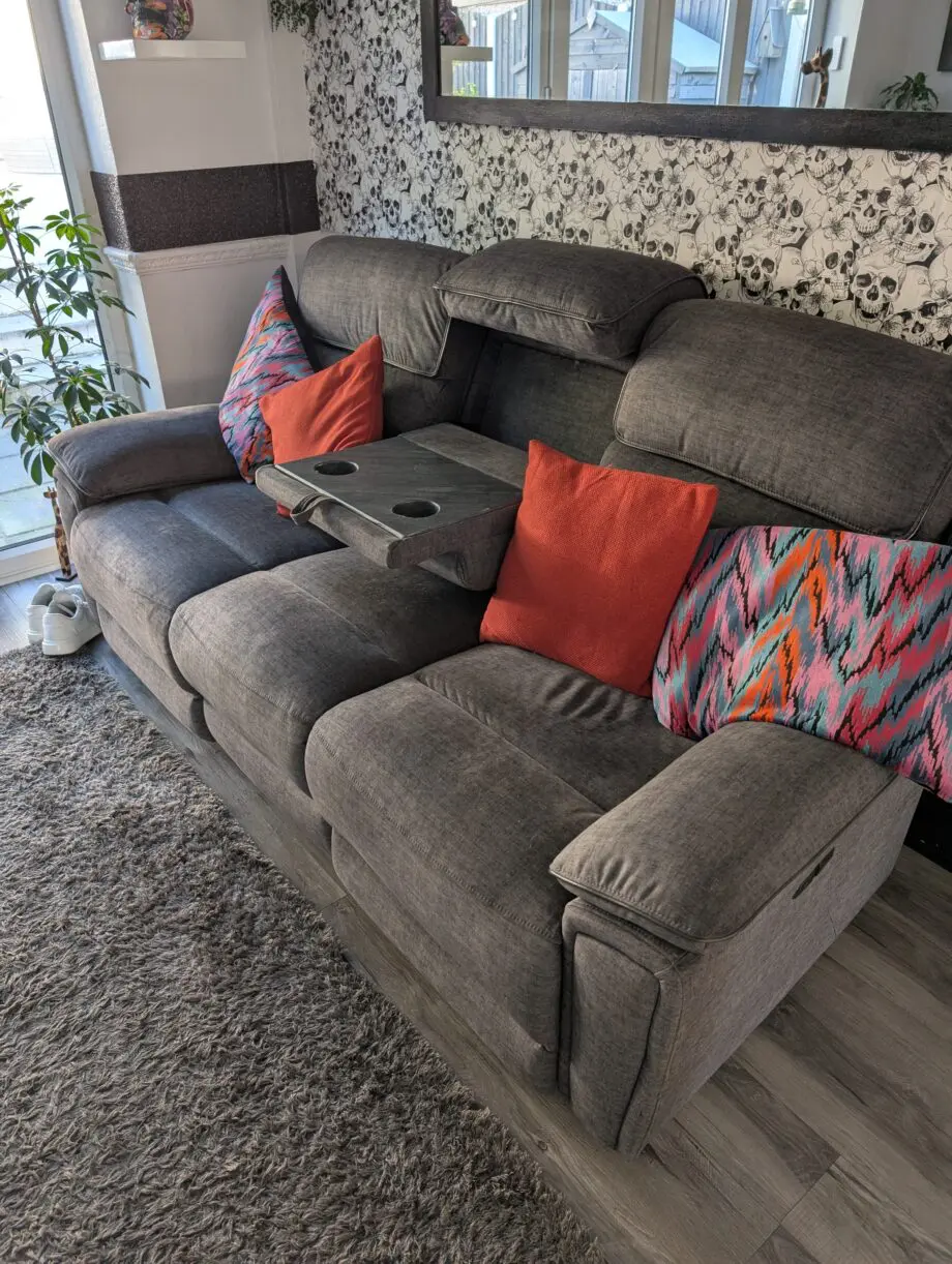 Electric reclining sofa with fold away table and reading lights