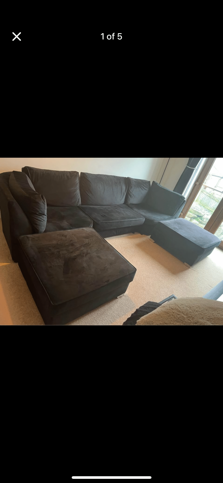 Black velvet 4 seater sofa with 2 foot stools