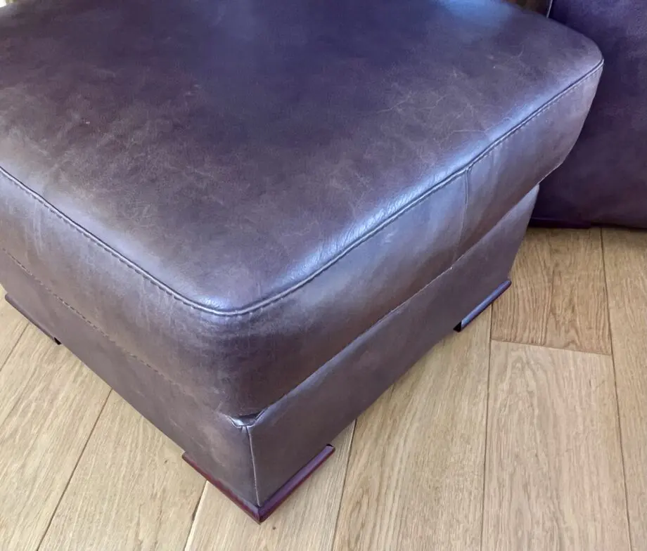 2 leather sofas and footstool made by David Paine Associates for John Lewis. Style is Baltimore a modern interpretation of a retro classic