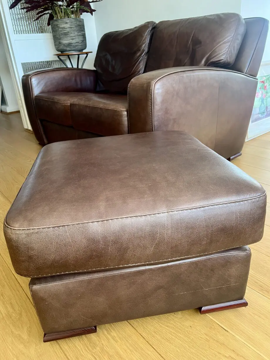 2 leather sofas and footstool made by David Paine Associates for John Lewis. Style is Baltimore a modern interpretation of a retro classic